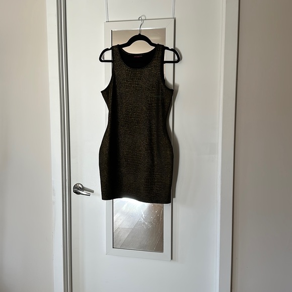 Dresses & Skirts - Black / Gold Sexy Mini dress
